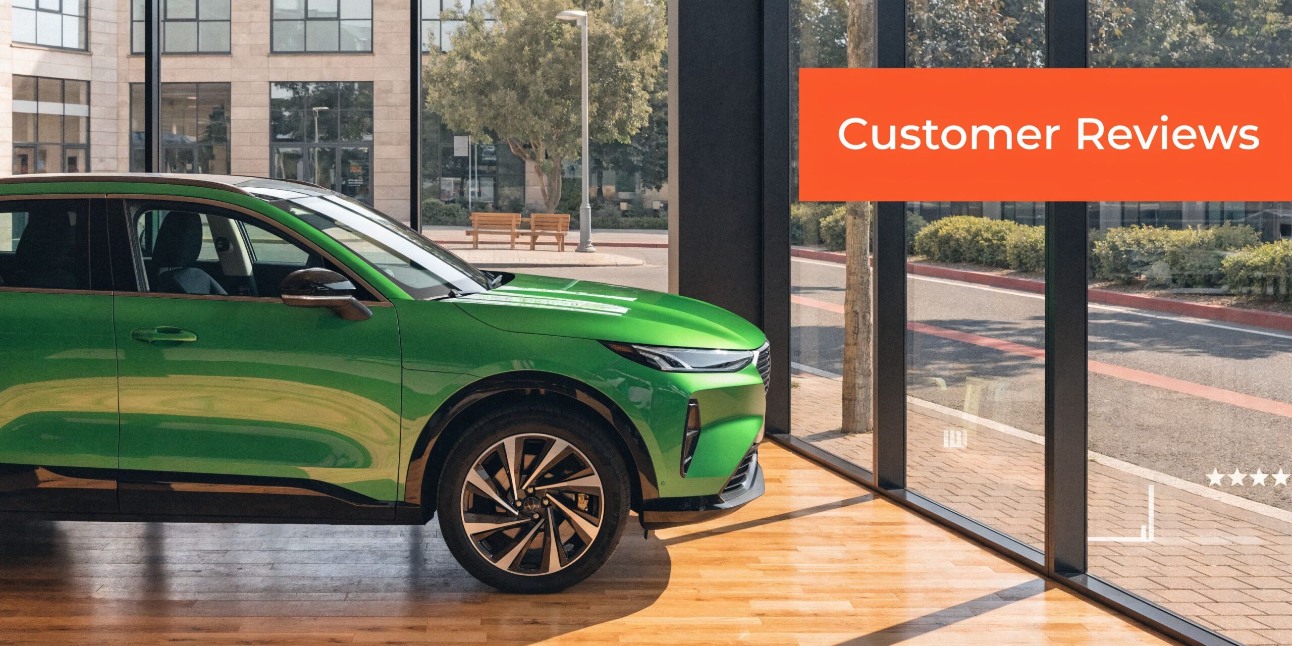 A modern green SUV displayed in a sunlit showroom next to large windows with a Customer Reviews sign.